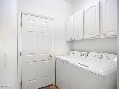 *Honey, we're home!* You're going to love this stunning attached on Herons Glen Golf and Country Club in Florida - for sale on GolfHomes.com, golf home, golf lot