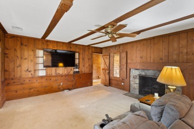 Rare opportunity on all-sports Goguac Lake! This 3-bedroom, 2 on Battle Creek Country Club in Michigan - for sale on GolfHomes.com, golf home, golf lot
