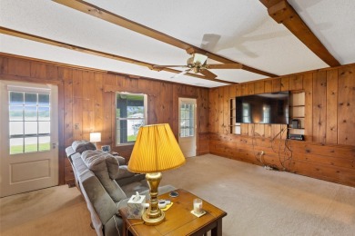 Rare opportunity on all-sports Goguac Lake! This 3-bedroom, 2 on Battle Creek Country Club in Michigan - for sale on GolfHomes.com, golf home, golf lot