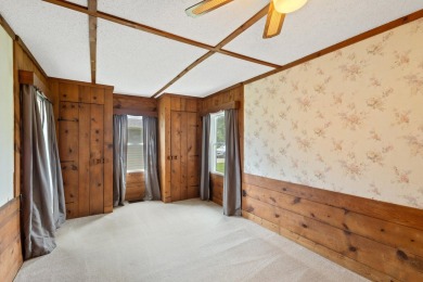 Rare opportunity on all-sports Goguac Lake! This 3-bedroom, 2 on Battle Creek Country Club in Michigan - for sale on GolfHomes.com, golf home, golf lot