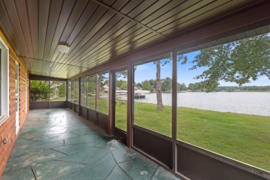 Rare opportunity on all-sports Goguac Lake! This 3-bedroom, 2 on Battle Creek Country Club in Michigan - for sale on GolfHomes.com, golf home, golf lot