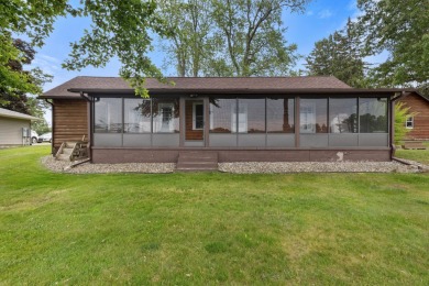 Rare opportunity on all-sports Goguac Lake! This 3-bedroom, 2 on Battle Creek Country Club in Michigan - for sale on GolfHomes.com, golf home, golf lot