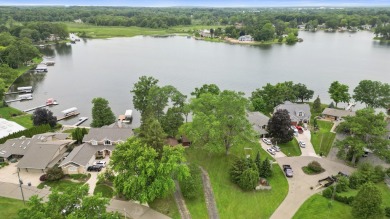 Rare opportunity on all-sports Goguac Lake! This 3-bedroom, 2 on Battle Creek Country Club in Michigan - for sale on GolfHomes.com, golf home, golf lot