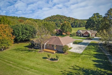 Located in White Plains Subdivision on the golf course, this 3BR on White Plains Golf Course in Tennessee - for sale on GolfHomes.com, golf home, golf lot