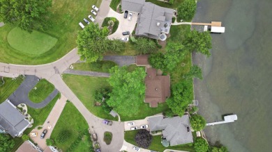 Rare opportunity on all-sports Goguac Lake! This 3-bedroom, 2 on Battle Creek Country Club in Michigan - for sale on GolfHomes.com, golf home, golf lot