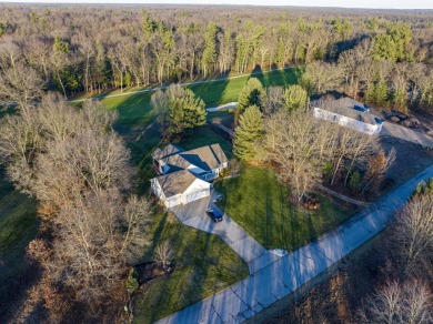 Discover a home that effortlessly combines luxury, recreation on Stonegate Golf Club in Michigan - for sale on GolfHomes.com, golf home, golf lot