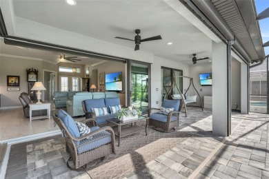 This exceptional residence, situated on the 13th hole of Twin on Twin Isles Country Club in Florida - for sale on GolfHomes.com, golf home, golf lot