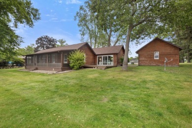 Rare opportunity on all-sports Goguac Lake! This 3-bedroom, 2 on Battle Creek Country Club in Michigan - for sale on GolfHomes.com, golf home, golf lot