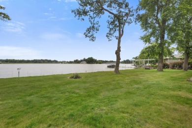 Rare opportunity on all-sports Goguac Lake! This 3-bedroom, 2 on Battle Creek Country Club in Michigan - for sale on GolfHomes.com, golf home, golf lot