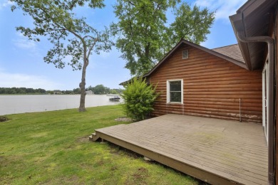 Rare opportunity on all-sports Goguac Lake! This 3-bedroom, 2 on Battle Creek Country Club in Michigan - for sale on GolfHomes.com, golf home, golf lot