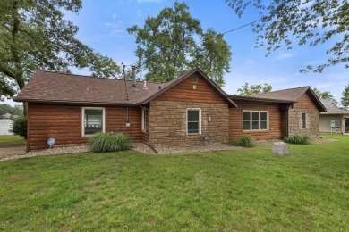Rare opportunity on all-sports Goguac Lake! This 3-bedroom, 2 on Battle Creek Country Club in Michigan - for sale on GolfHomes.com, golf home, golf lot