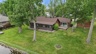 Rare opportunity on all-sports Goguac Lake! This 3-bedroom, 2 on Battle Creek Country Club in Michigan - for sale on GolfHomes.com, golf home, golf lot