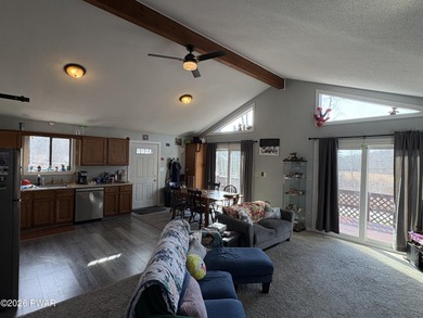 Welcome to this spacious and inviting 4-bedroom, 2-bath home on The Hideout Golf in Pennsylvania - for sale on GolfHomes.com, golf home, golf lot