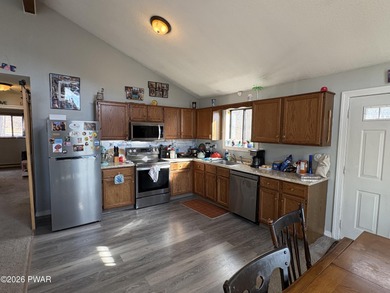 Welcome to this spacious and inviting 4-bedroom, 2-bath home on The Hideout Golf in Pennsylvania - for sale on GolfHomes.com, golf home, golf lot