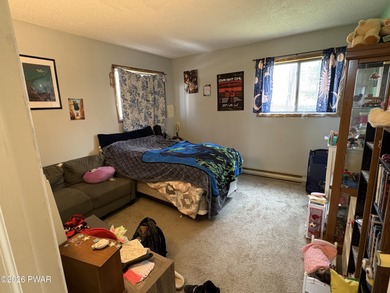 Welcome to this spacious and inviting 4-bedroom, 2-bath home on The Hideout Golf in Pennsylvania - for sale on GolfHomes.com, golf home, golf lot