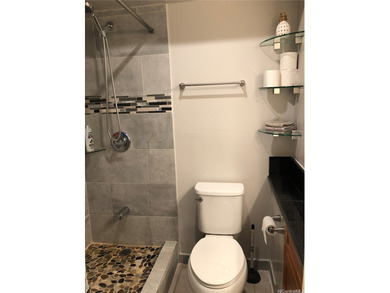 Modern open-plan studio unit featuring a contemporary kitchen on Ala Wai Golf Course in Hawaii - for sale on GolfHomes.com, golf home, golf lot