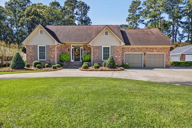 This beautiful brick home is perfectly situated on the scenic on Santee-Cooper Country Club in South Carolina - for sale on GolfHomes.com, golf home, golf lot