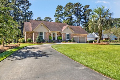 This beautiful brick home is perfectly situated on the scenic on Santee-Cooper Country Club in South Carolina - for sale on GolfHomes.com, golf home, golf lot