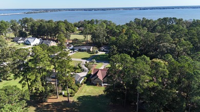 This beautiful brick home is perfectly situated on the scenic on Santee-Cooper Country Club in South Carolina - for sale on GolfHomes.com, golf home, golf lot