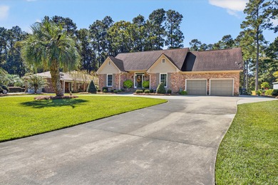This beautiful brick home is perfectly situated on the scenic on Santee-Cooper Country Club in South Carolina - for sale on GolfHomes.com, golf home, golf lot