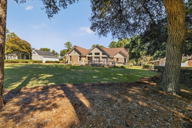 This beautiful brick home is perfectly situated on the scenic on Santee-Cooper Country Club in South Carolina - for sale on GolfHomes.com, golf home, golf lot