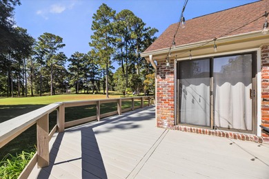 This beautiful brick home is perfectly situated on the scenic on Santee-Cooper Country Club in South Carolina - for sale on GolfHomes.com, golf home, golf lot