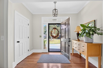 This beautiful brick home is perfectly situated on the scenic on Santee-Cooper Country Club in South Carolina - for sale on GolfHomes.com, golf home, golf lot
