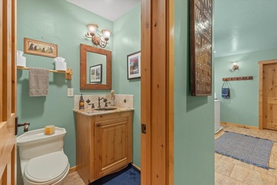 Experience the perfect blend of rustic charm and refined living on Bailey Creek Golf Course in California - for sale on GolfHomes.com, golf home, golf lot