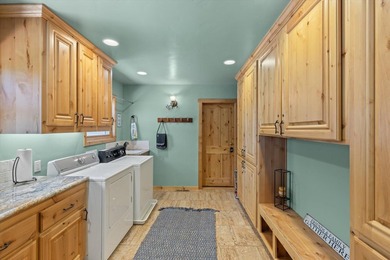 Experience the perfect blend of rustic charm and refined living on Bailey Creek Golf Course in California - for sale on GolfHomes.com, golf home, golf lot