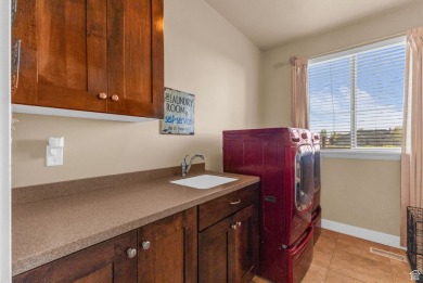 You'll be welcomed into this stunning home with tall ceilings on Glen Eagle Golf Course in Utah - for sale on GolfHomes.com, golf home, golf lot