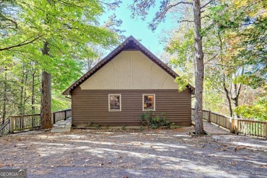 Darling Bavarian style chalet with a great view in the beautiful on Sky Valley Resort and Country Club in Georgia - for sale on GolfHomes.com, golf home, golf lot