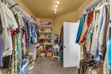 You'll be welcomed into this stunning home with tall ceilings on Glen Eagle Golf Course in Utah - for sale on GolfHomes.com, golf home, golf lot