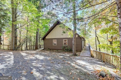 Darling Bavarian style chalet with a great view in the beautiful on Sky Valley Resort and Country Club in Georgia - for sale on GolfHomes.com, golf home, golf lot