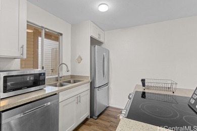 Wake up to peaceful greenbelt views in this rare perimeter on Leilehua Golf Course in Hawaii - for sale on GolfHomes.com, golf home, golf lot