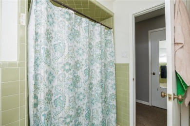 This could be the home for you! Steps away from the first green on Corpus Christi Country Club Golf Course in Texas - for sale on GolfHomes.com, golf home, golf lot