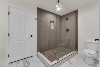 You'll be welcomed into this stunning home with tall ceilings on Glen Eagle Golf Course in Utah - for sale on GolfHomes.com, golf home, golf lot