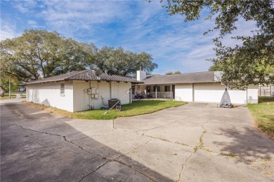 This could be the home for you! Steps away from the first green on Corpus Christi Country Club Golf Course in Texas - for sale on GolfHomes.com, golf home, golf lot