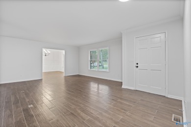 ASSUMABLE 5.25% VA LOAN! Stunning fully remodeled home for sale on Burningtree Country Club in Alabama - for sale on GolfHomes.com, golf home, golf lot