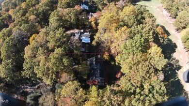 This property offers the perfect opportunity for buyers seeking on MacGregor Downs Country Club in North Carolina - for sale on GolfHomes.com, golf home, golf lot