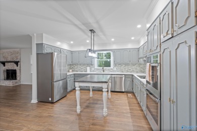 ASSUMABLE 5.25% VA LOAN! Stunning fully remodeled home for sale on Burningtree Country Club in Alabama - for sale on GolfHomes.com, golf home, golf lot