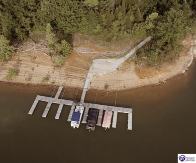 Lakefront Home with 2 Docks on 3 lots totaling 3.43 acres. Docks on Rough River Dam State Resort Park Golf Course in Kentucky - for sale on GolfHomes.com, golf home, golf lot