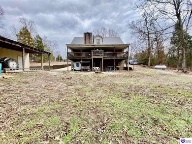 Lakefront Home with 2 Docks on 3 lots totaling 3.43 acres. Docks on Rough River Dam State Resort Park Golf Course in Kentucky - for sale on GolfHomes.com, golf home, golf lot