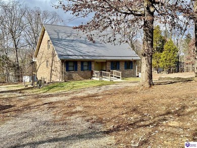 Lakefront Home with 2 Docks on 3 lots totaling 3.43 acres. Docks on Rough River Dam State Resort Park Golf Course in Kentucky - for sale on GolfHomes.com, golf home, golf lot