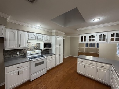 Welcome to 980 Dogwood Drive, where comfort, space, and location on Sugar Creek Country Club in Arkansas - for sale on GolfHomes.com, golf home, golf lot