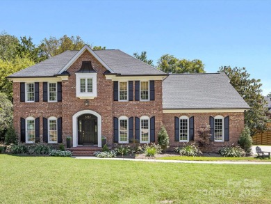 Stunning updated 2 story brick home located in the highly on Carmel Country Club in North Carolina - for sale on GolfHomes.com, golf home, golf lot