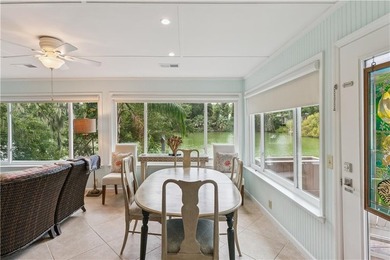 This South-end bungalow offers beautiful views of Lake Worth in on Sea Island Golf Club in Georgia - for sale on GolfHomes.com, golf home, golf lot