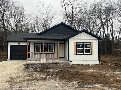 New Construction Lake Cottage in Linn Valley Lakes. Perfect cozy on Linn Valley Lakes - Deer Trace Golf Course in Kansas - for sale on GolfHomes.com, golf home, golf lot