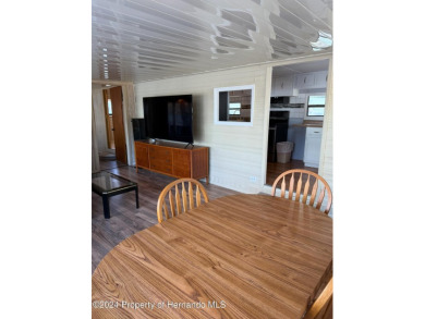 NO LOT RENT, it is a deeded lot, 2 bedrooms 1-1/2 Baths on Tooke on Glen Lakes Country Club in Florida - for sale on GolfHomes.com, golf home, golf lot