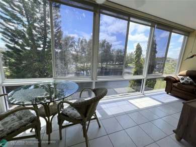 LOCATION! LOCATION!! DIRECTLY AROSS FROM THE CLUBHOUSE! COME AND on Hillsboro Pines Golf in Florida - for sale on GolfHomes.com, golf home, golf lot