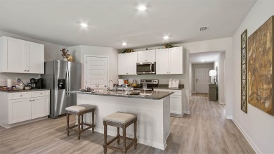 Welcome to the Freeport Plan, a new home floor plan at Sunny on Sunny Hills Golf and Country Club in Florida - for sale on GolfHomes.com, golf home, golf lot